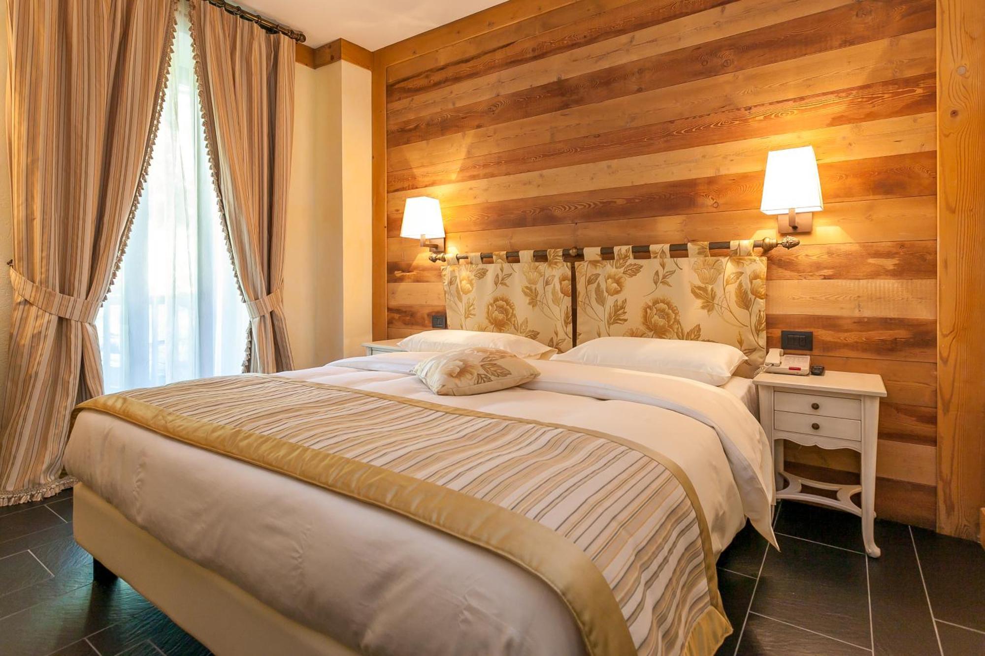 Hotel Lo Scoiattolo Курмайор Номер фото